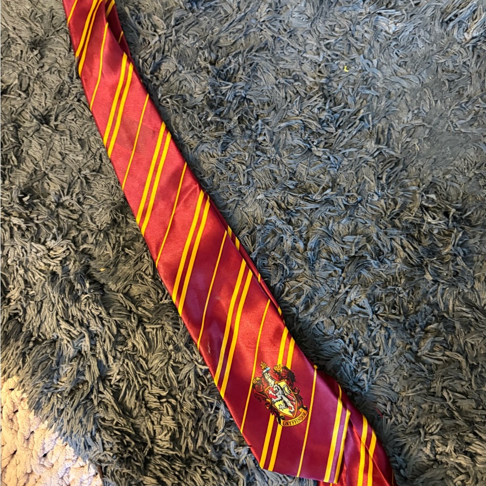 Warner Bros. Burgundy and Gold Striped Men's Tie with Crest